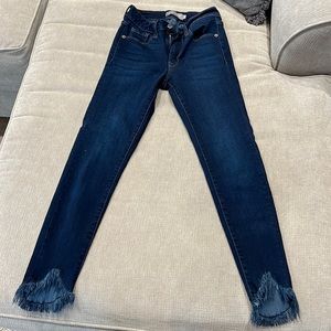 Dark wash with fringe at ankle